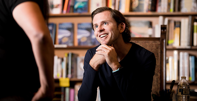 Chris Guillebeau listening to a question