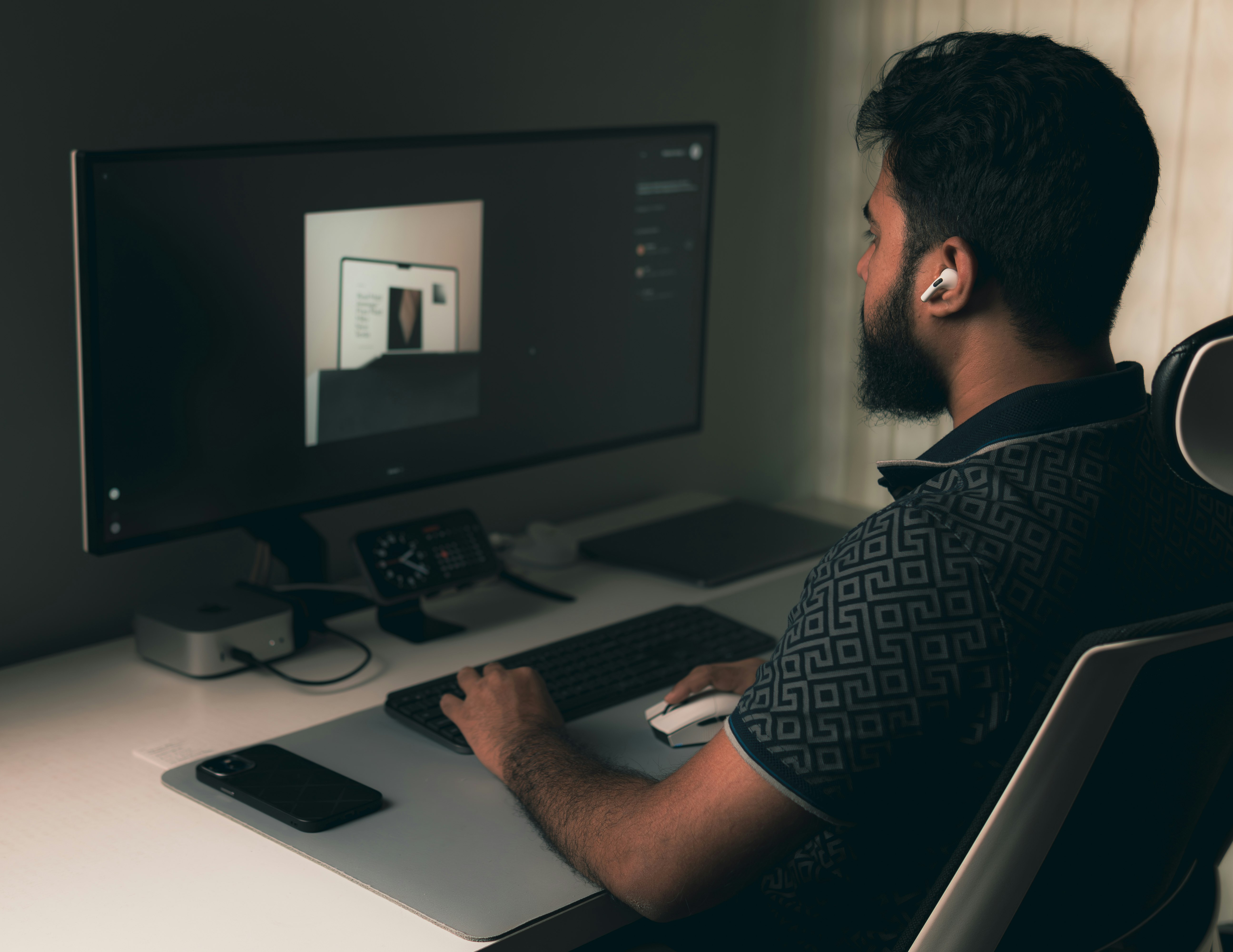 Man working on a laptop at a desk